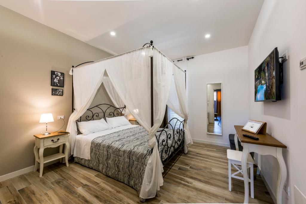 Posteľ alebo postele v izbe v ubytovaní Il Parco dei Poeti B&B
