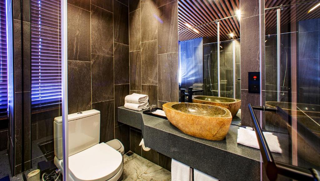 Koupelna v ubytování JSL hotel