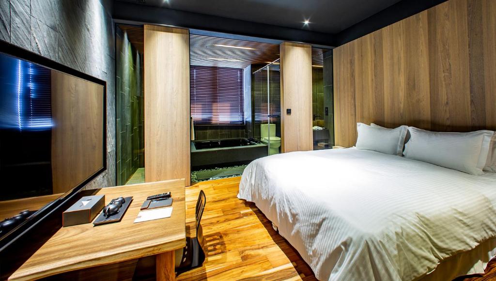 Кровать или кровати в номере JSL hotel