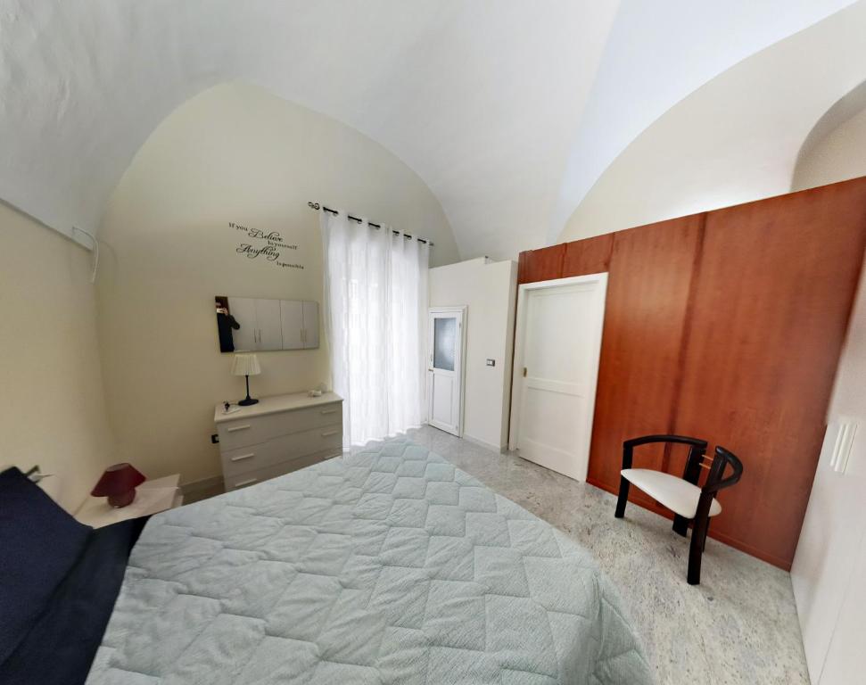 Posteľ alebo postele v izbe v ubytovaní Appartamento Manfredi
