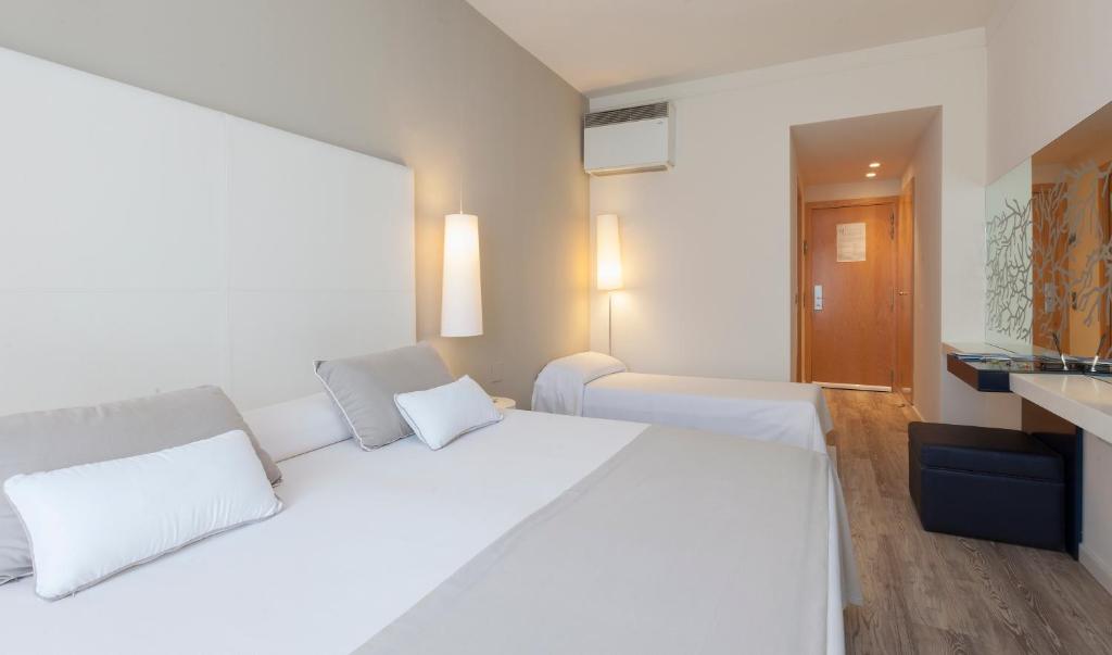 Llit o llits en una habitació de Canyelles Platja