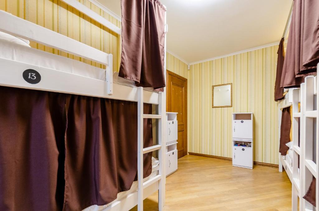 Postel nebo postele na pokoji v ubytování Sun City Hostel 3