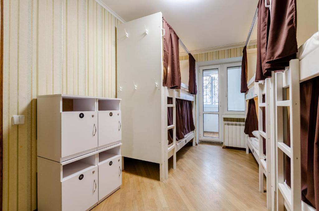 Postel nebo postele na pokoji v ubytování Sun City Hostel 3