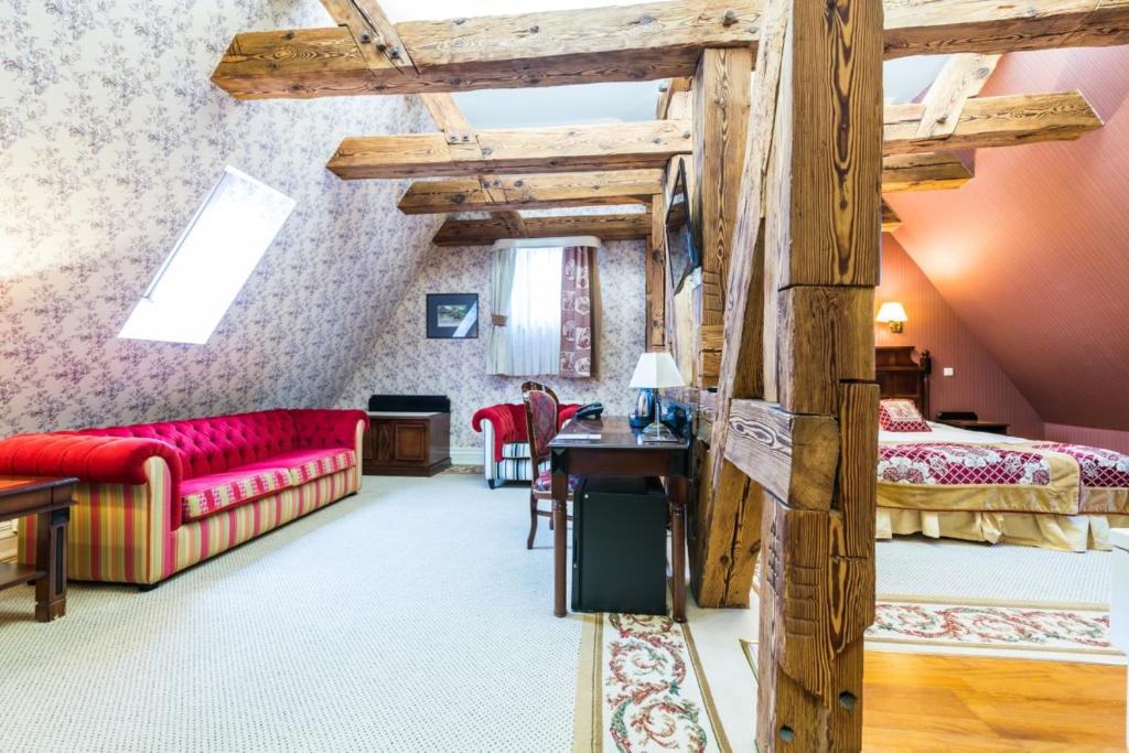 Postel nebo postele na pokoji v ubytování Hotel St. Bruno