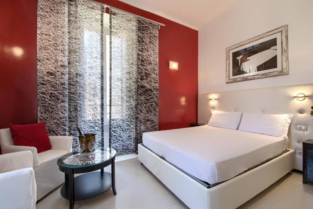 A bed or beds in a room at Alloggio per uso turistico D'Ambrosio Antonella Gli Scipioni 53