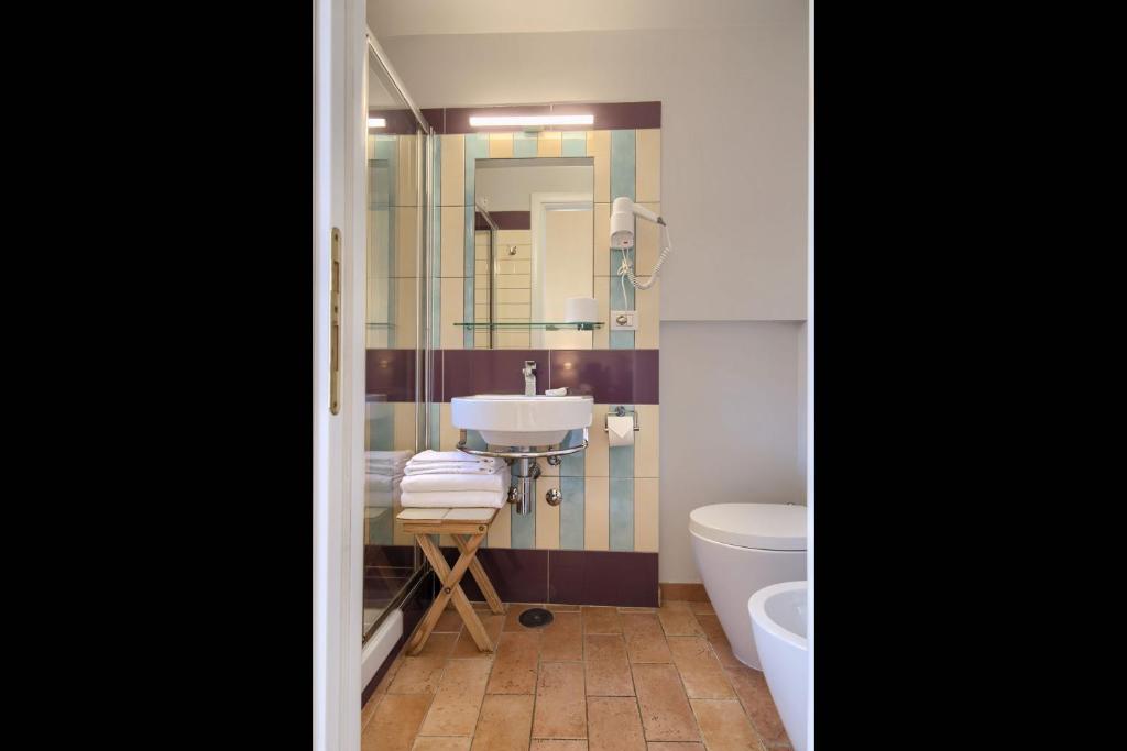 A bathroom at Alloggio per uso turistico D'Ambrosio Antonella Gli Scipioni 53