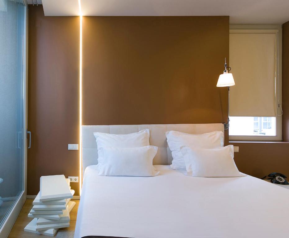 Postel nebo postele na pokoji v ubytování Hotel Fabrica do Chocolate