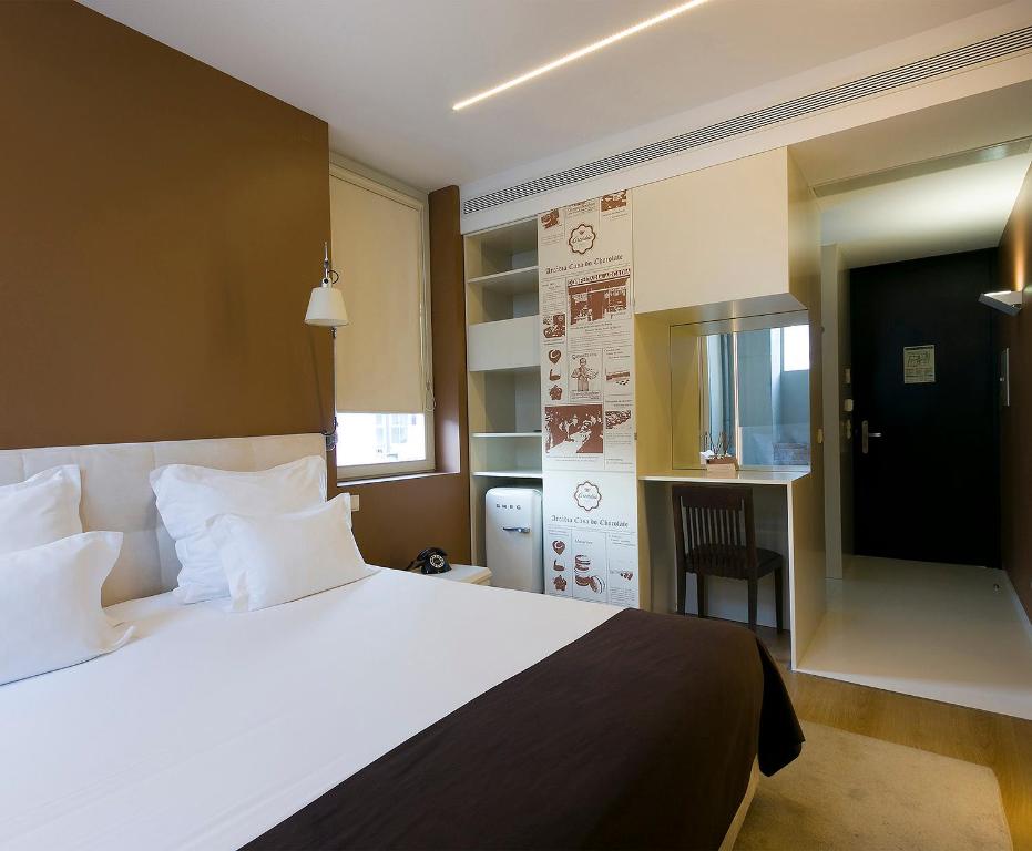 Postel nebo postele na pokoji v ubytování Hotel Fabrica do Chocolate