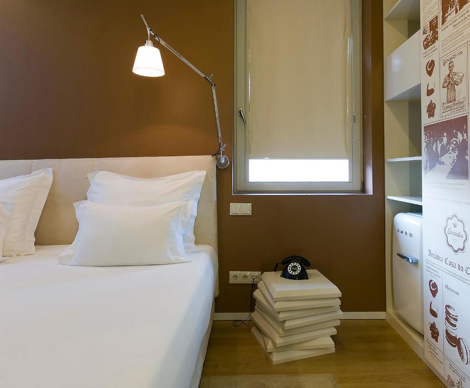 Postel nebo postele na pokoji v ubytování Hotel Fabrica do Chocolate