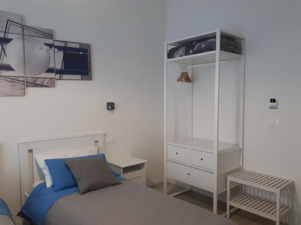 Łóżko lub łóżka w pokoju w obiekcie SoleLuna Fiera 6 Rooms
