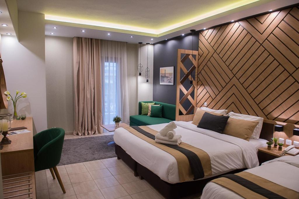 Postel nebo postele na pokoji v ubytování Sokratis Hotel