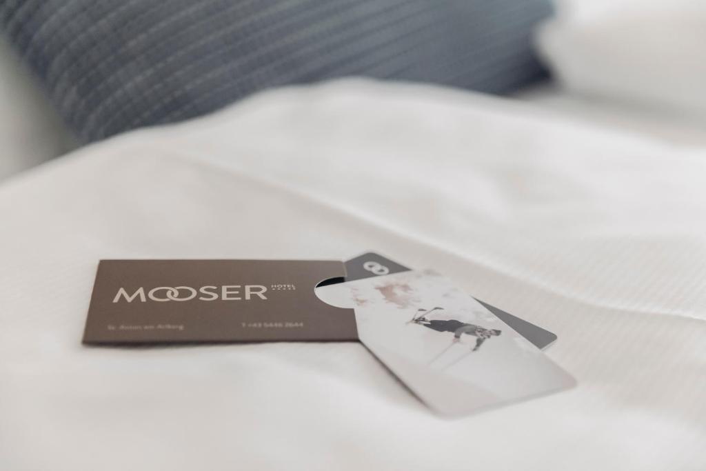Postel nebo postele na pokoji v ubytování Mooser Hotel
