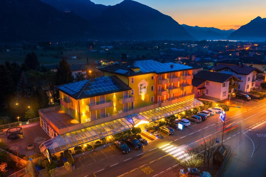 an aerial view of a hotel at night at Hotel Castel Lodron in Storo