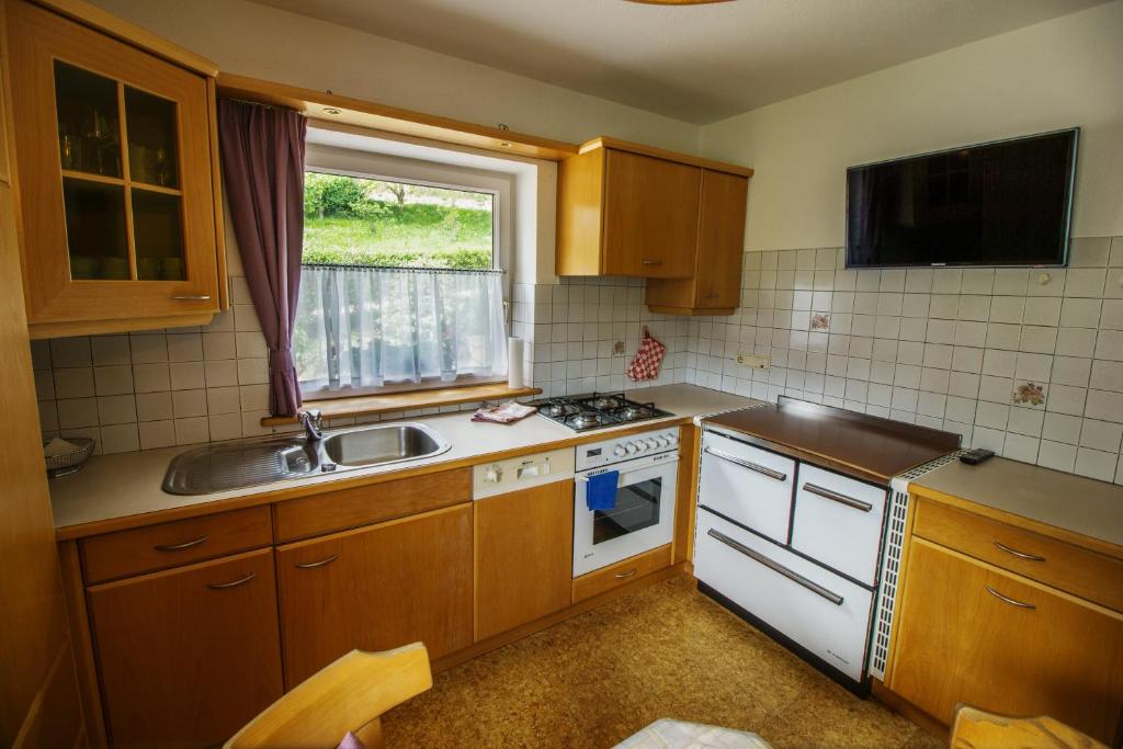 Kuchyň nebo kuchyňský kout v ubytování Appartments Neuhof