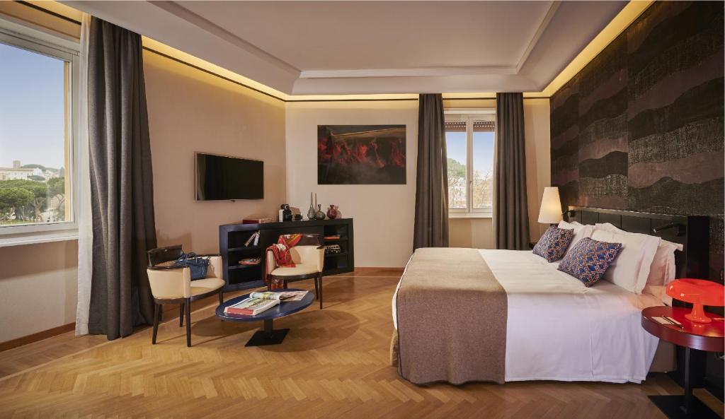 A bed or beds in a room at 47 Boutique Hotel