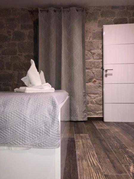 Posteľ alebo postele v izbe v ubytovaní Elegant Residence Rooms