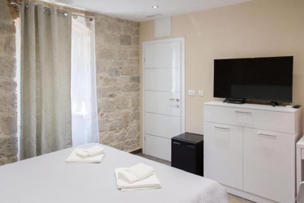 Posteľ alebo postele v izbe v ubytovaní Elegant Residence Rooms