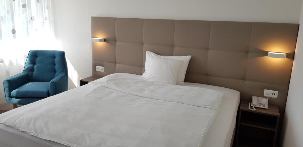 Postel nebo postele na pokoji v ubytování Hotel Al Ponte