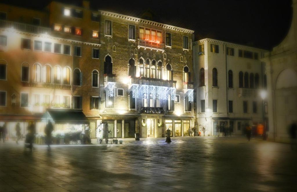 
a city street filled with lots of water and buildings at Hotel Palazzo Vitturi in Venice
