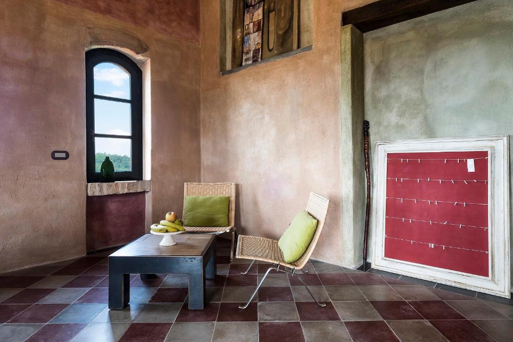 Posezení v ubytování Palazzo d'Assi - Guest house