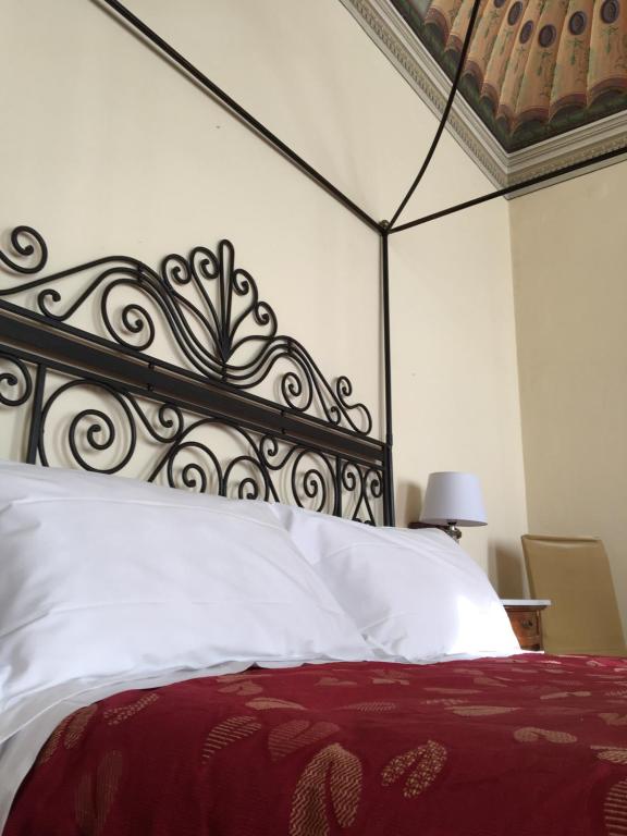 Postel nebo postele na pokoji v ubytování B&B Il Gianduia