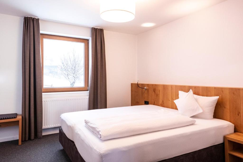 Postel nebo postele na pokoji v ubytování Valschena Appartements