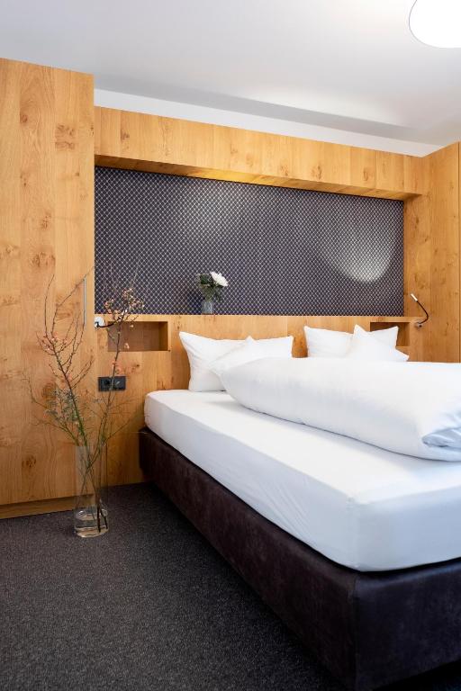 Postel nebo postele na pokoji v ubytování Valschena Appartements