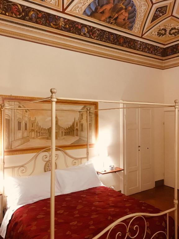 Postel nebo postele na pokoji v ubytování B&B Il Gianduia