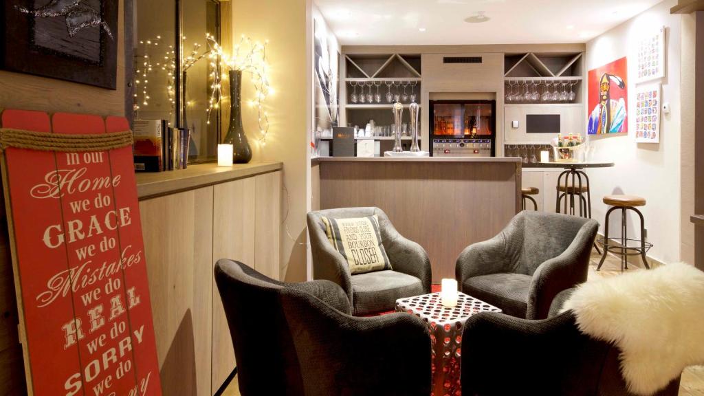 Posezení v ubytování Hotel Le Tremplin