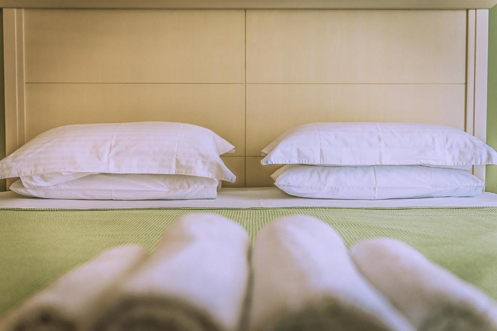 Postel nebo postele na pokoji v ubytování Elaia Boutique Apartments