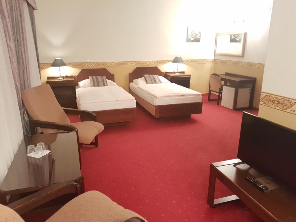Postel nebo postele na pokoji v ubytování Eurohotel