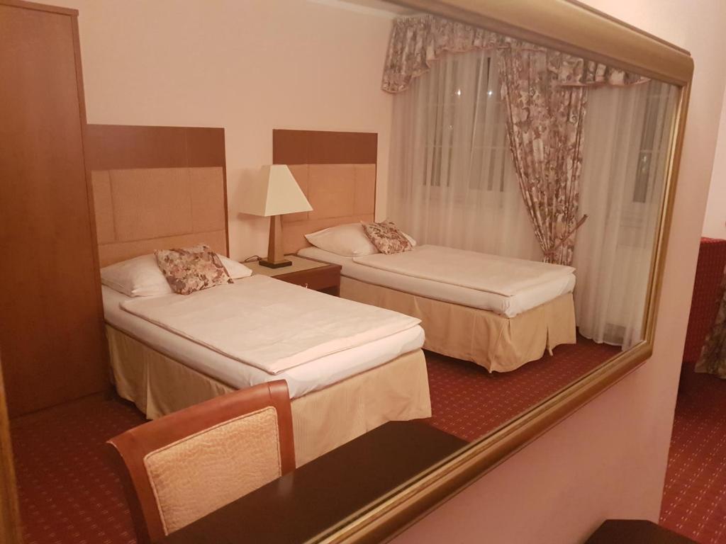 Postel nebo postele na pokoji v ubytování Eurohotel
