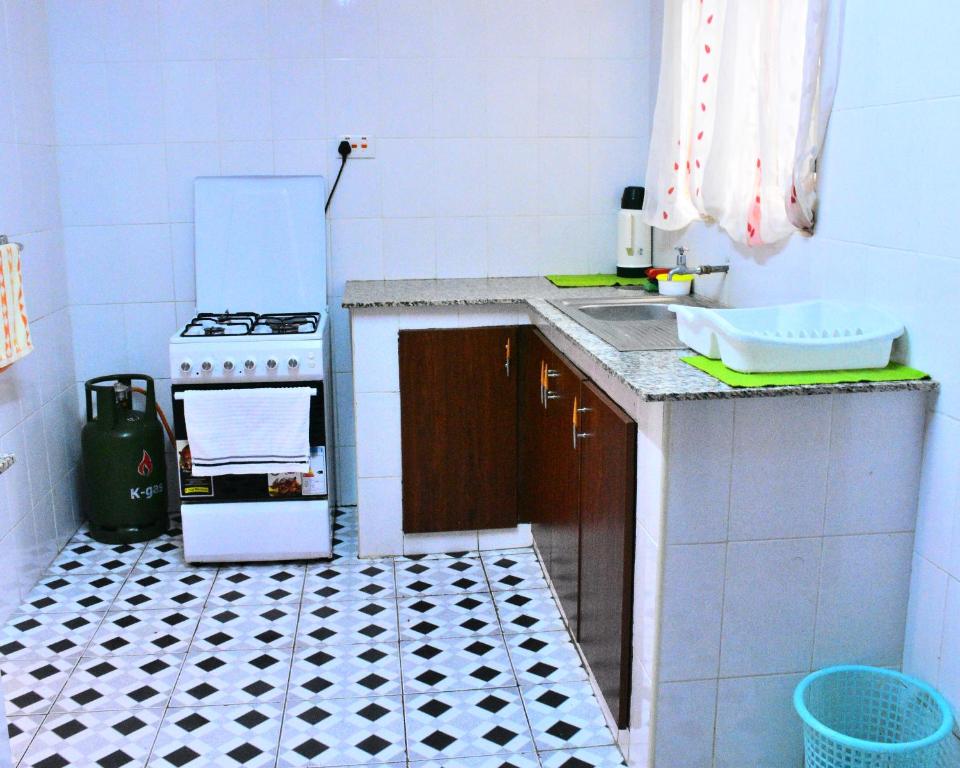 Kuchyň nebo kuchyňský kout v ubytování Essy's Furnished Homes Nakuru with pool & GYM
