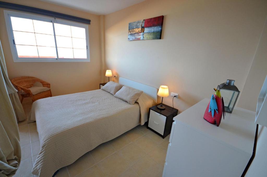Postel nebo postele na pokoji v ubytování Ferienwohnung Paraiso 2 Costa Calma Meerblick