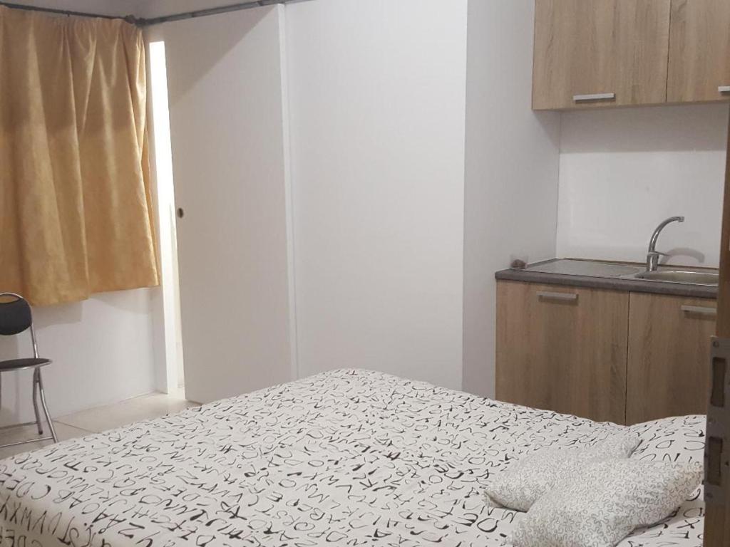 Postel nebo postele na pokoji v ubytování City Large Studio