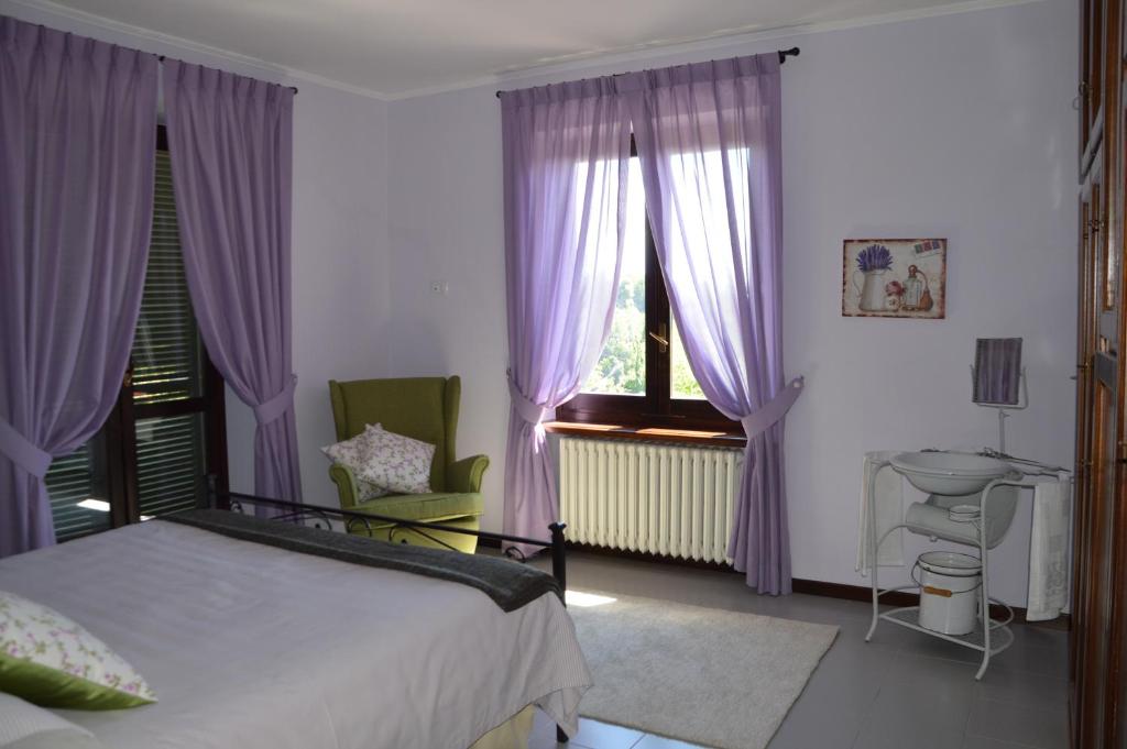 Postel nebo postele na pokoji v ubytování IL SEGNAVENTO