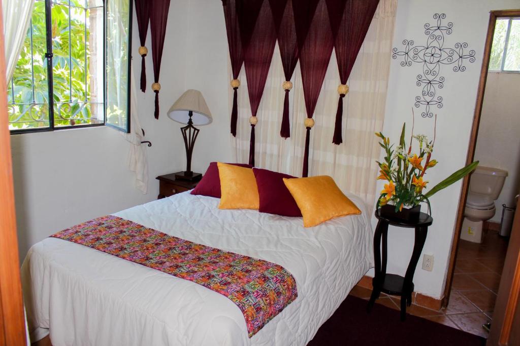 Postel nebo postele na pokoji v ubytování Hacienda La Moreda Hotel Boutique & Spa