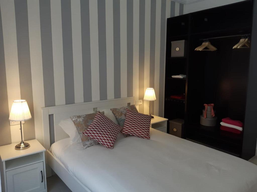 Postel nebo postele na pokoji v ubytování Apartment San Carlos Alicante