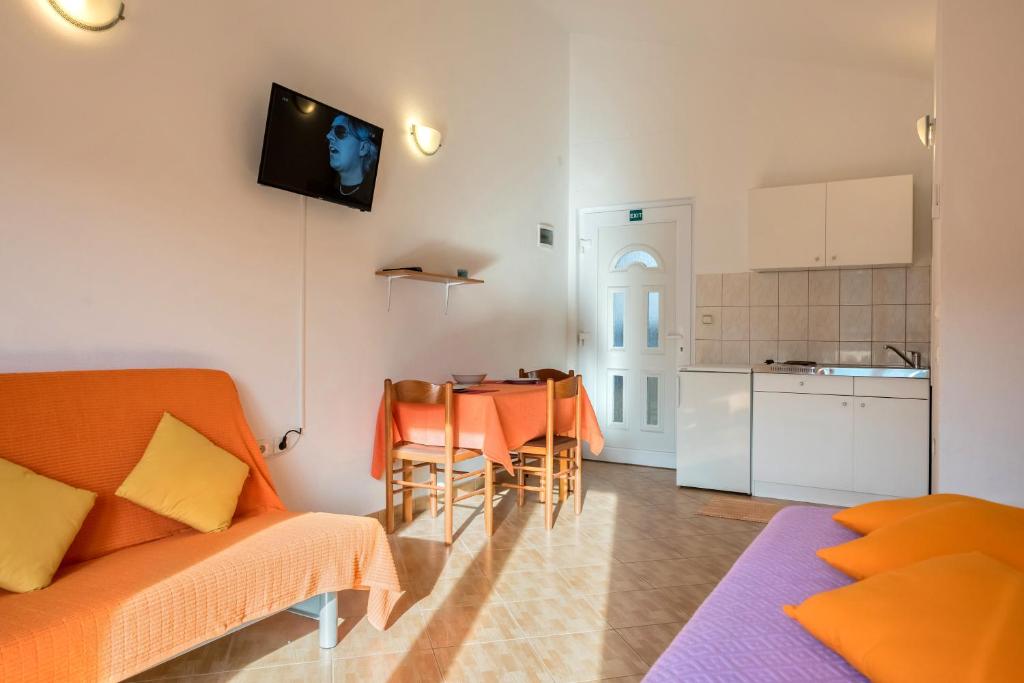Kuchyň nebo kuchyňský kout v ubytování Apartments Slavica