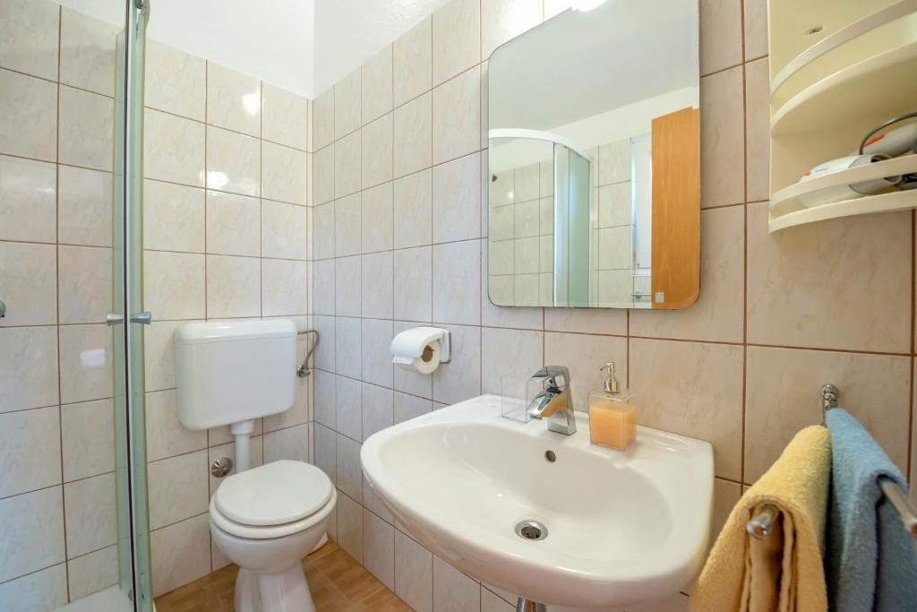 Koupelna v ubytování Apartments Slavica
