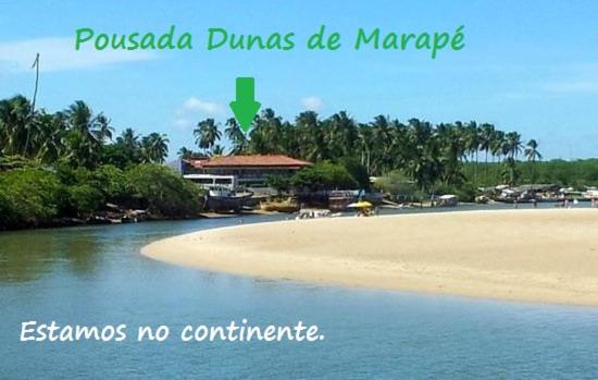 a picture of a beach with the words possada dums de maragog at Dunas de Marape in Jequia da Praia