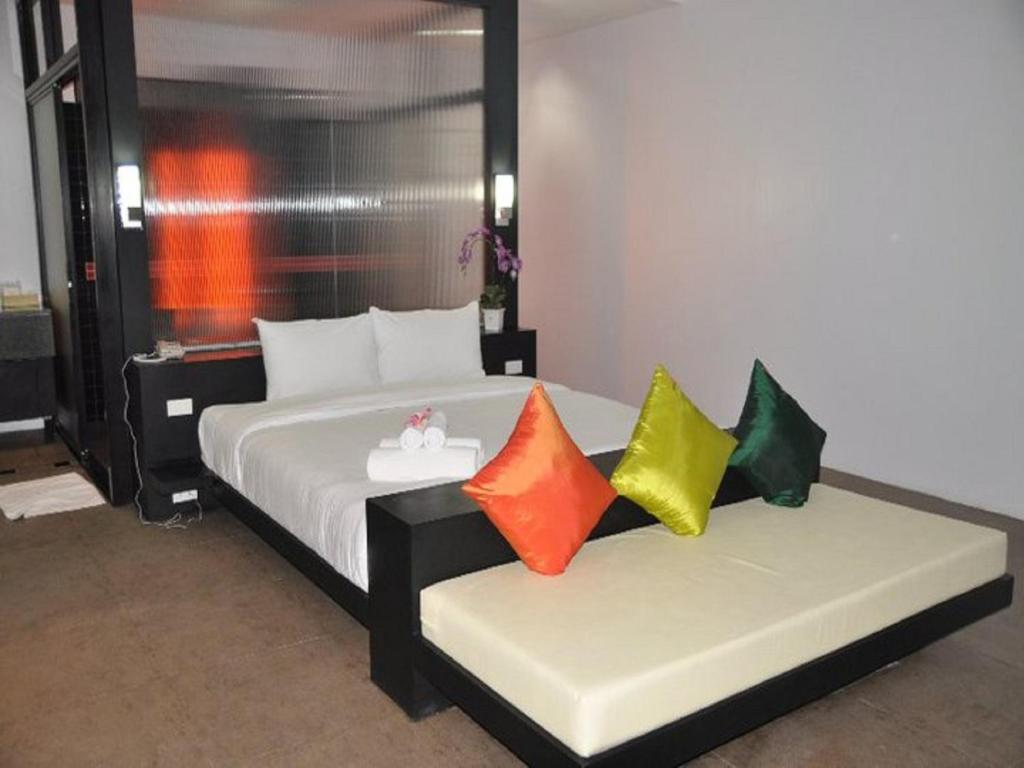 Postel nebo postele na pokoji v ubytování Khun Chaweng Resort