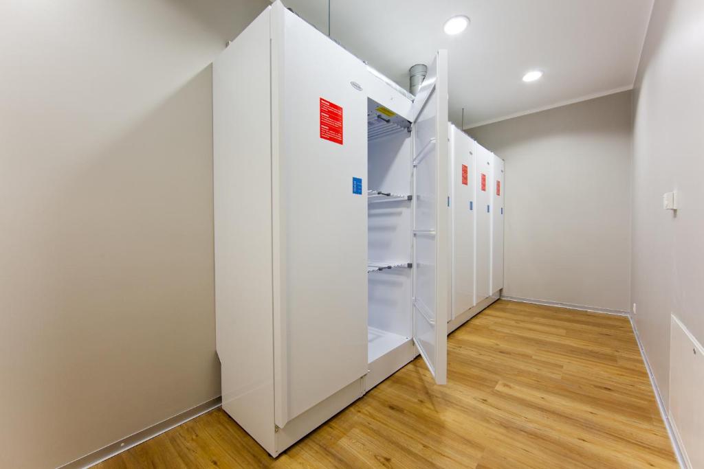 Postel nebo postele na pokoji v ubytování Just Rest Automatic Hostel