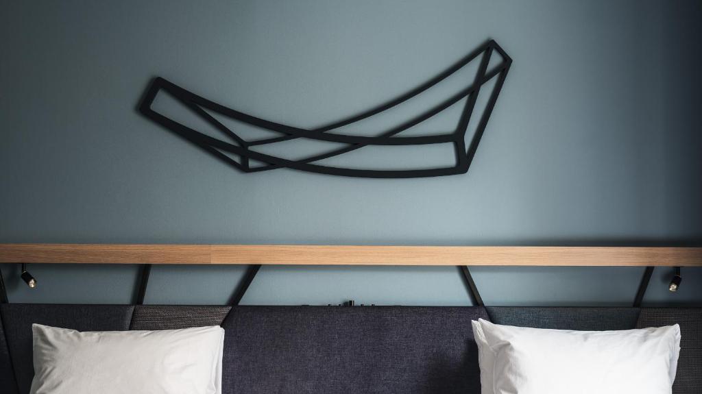 Postel nebo postele na pokoji v ubytování Nest Hotel Osaka Umeda