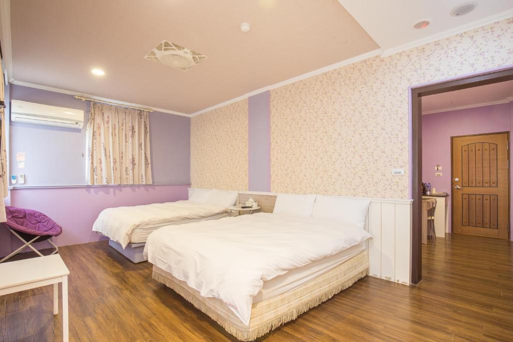 Postel nebo postele na pokoji v ubytování N. Castle Hotel