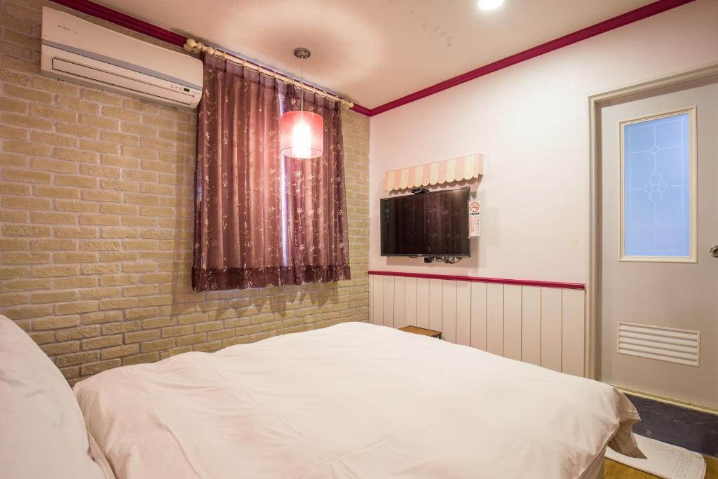 TV a/nebo společenská místnost v ubytování N. Castle Hotel