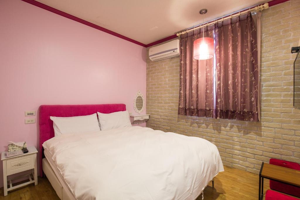 Postel nebo postele na pokoji v ubytování N. Castle Hotel