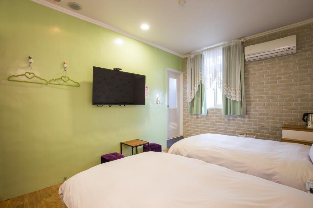 Postel nebo postele na pokoji v ubytování N. Castle Hotel