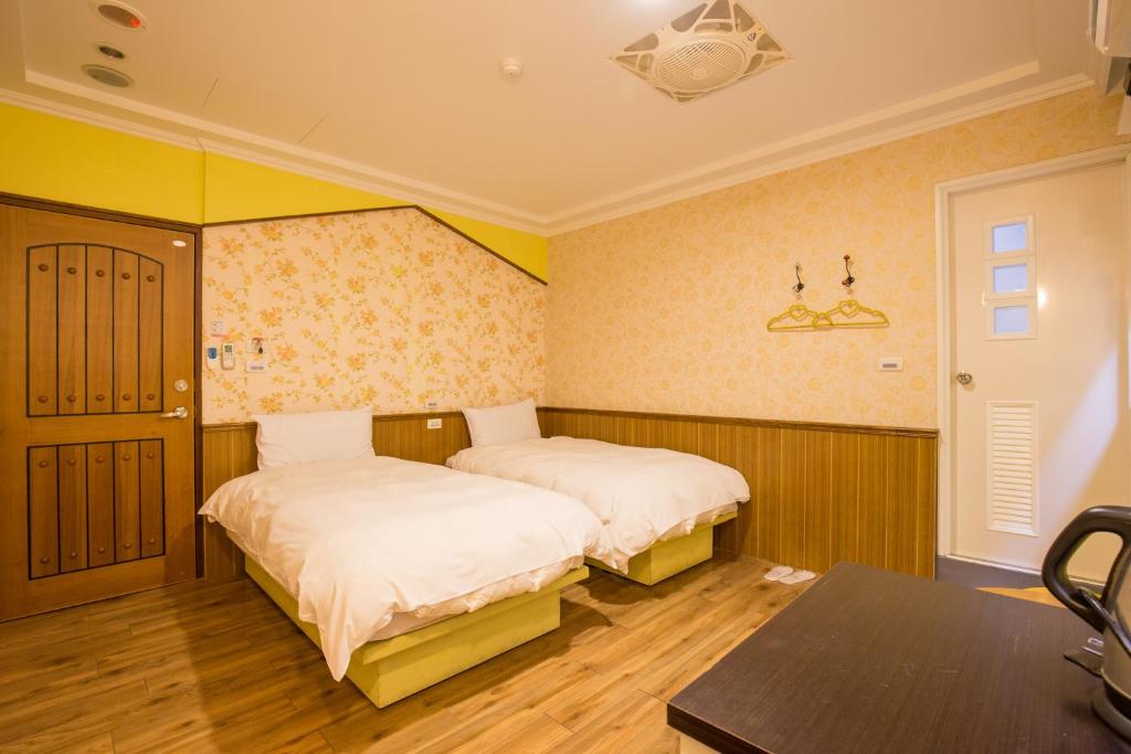 Postel nebo postele na pokoji v ubytování N. Castle Hotel