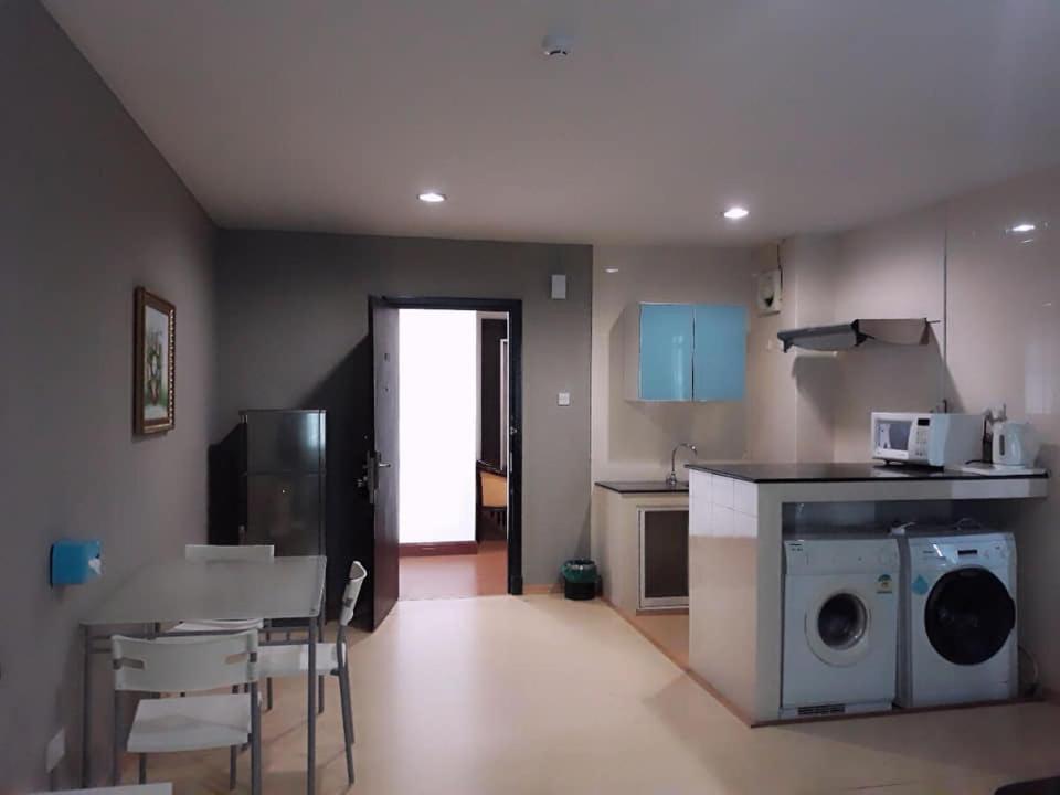 Kuchyň nebo kuchyňský kout v ubytování Ginasuite Kompleks27 Hotel